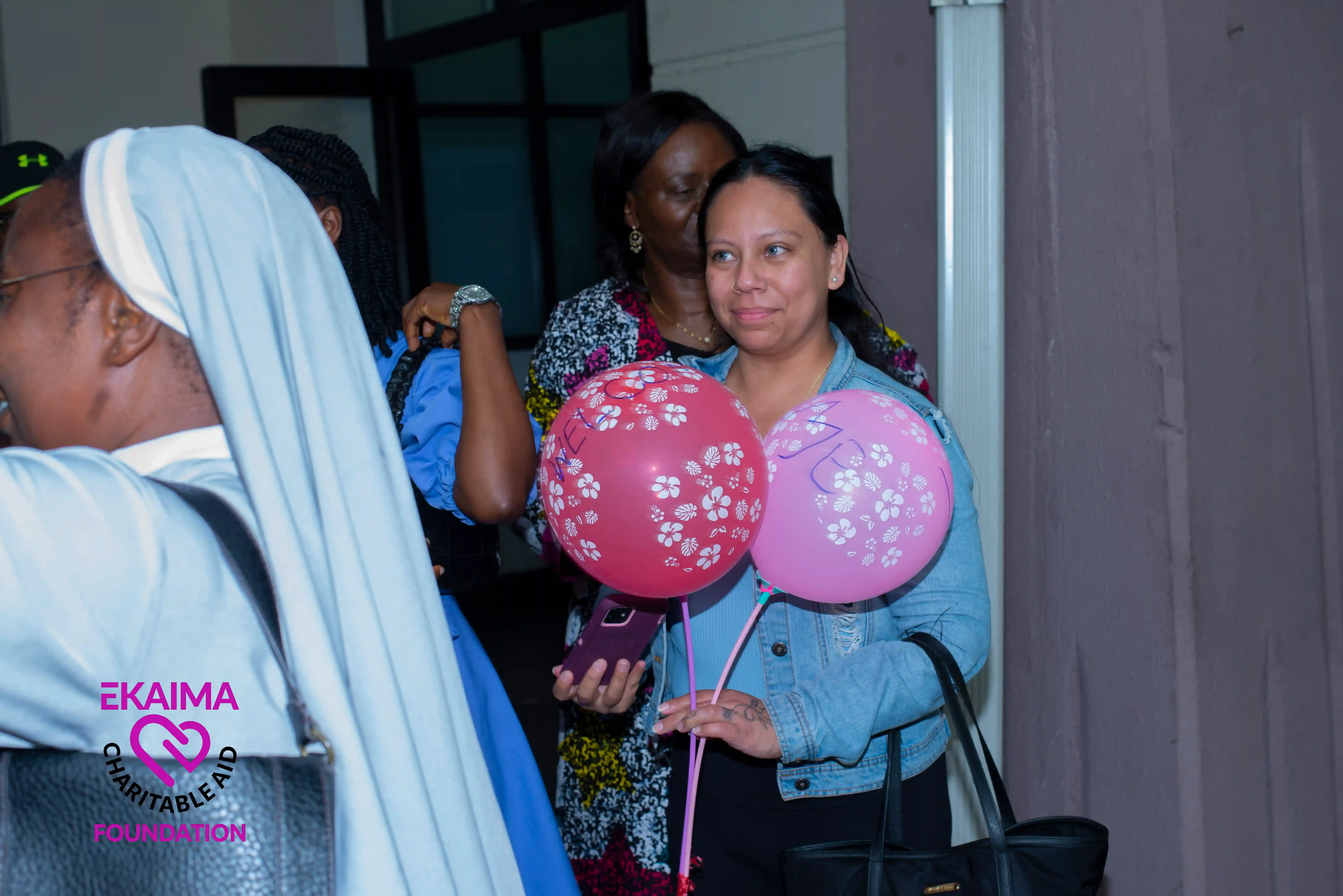 Graduate receiving certificate at ECAF program.